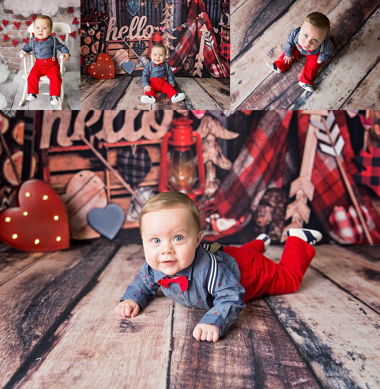 Little Man in bow tie and suspenders in front of Valentines Backdrop